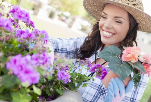 Professional gardeners reviewing health and safety standards